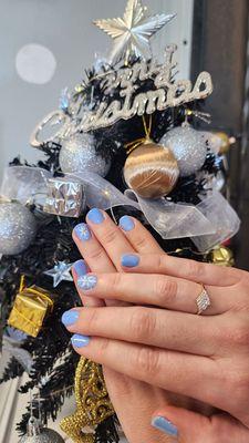 Blue snowflake nails