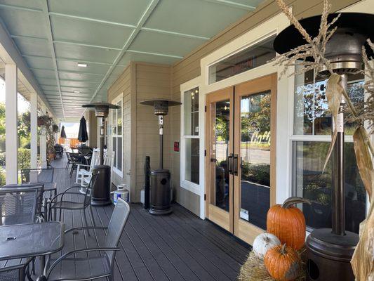 Front view and porch seating, so inviting!