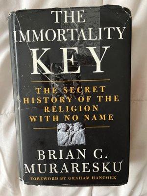 A now, very well loved, copy of The Immortality Key. (It was PRISTINE & NEW when I got it from Charm City Books in 2020)