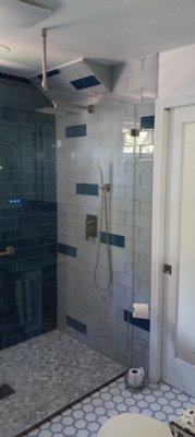 Fixed panel shower wall.