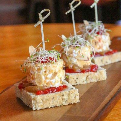 Goat Cheese, Candied tomatoes, Caramelized onion, Homemade Fresh Focaccia  bread.