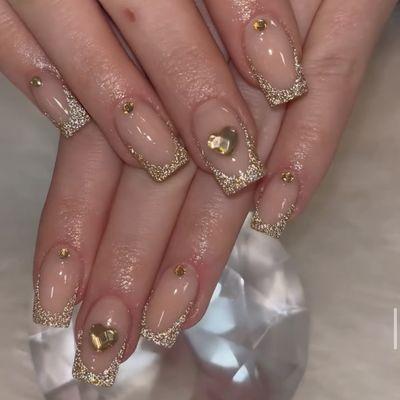 Nails by Kylie! Gold glitter French with bling!