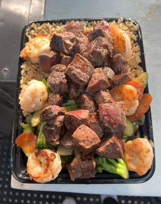 Fillet Mignon & Shrimp combo plate. Served with extra steak ( extra cost)