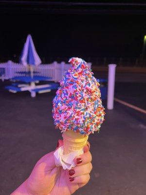 Vanilla soft serve with rainbow sprinkles