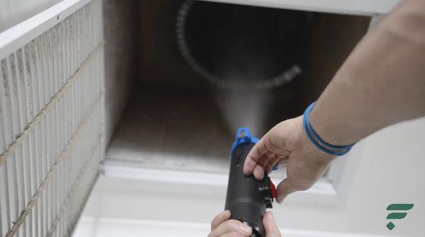 A Filterbuy LOCAL technician sanitizing the ductwork for a Florida client.