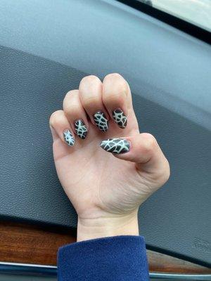 Almond shaped, giraffe print nails