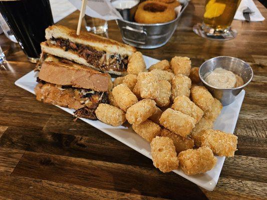 The Turkey Burnt Ends Sandwich with seasoned tots. Similar to a pulled pork sandwich, but with turkey. Was very tasty!