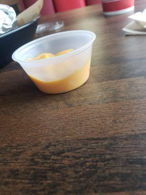 HERE IS WHAT YOU GET FOR .99 WHEN ORDERING A CHEESE CUP. MANAGEMENT SAYS ITS BECAUSE OF INFLATION !