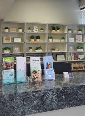 This is our front desk and applications for credit financing. We have many options for financing your dental needs.