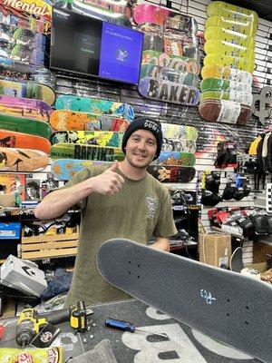 Our skateboard and the young man who helped us.