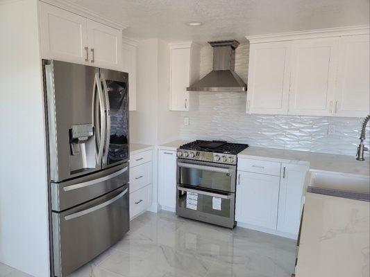 Kitchen Remodel in Walnut, CA complete with custom cabinets and 3D backsplash.