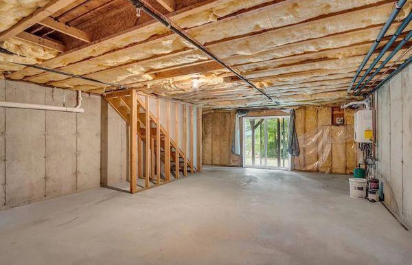 Unfinished basement prior to craftmanship by DM Plastering