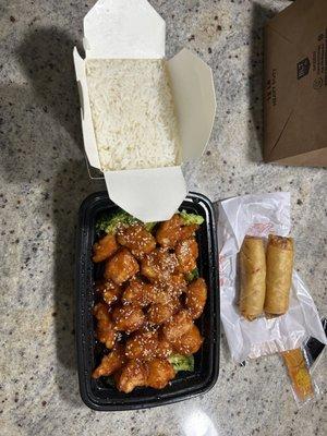 Sesame Chicken with white rice; Spring rolls