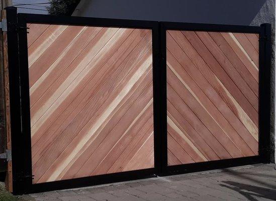 Metal framed double gate. Power coated frame with clear redwood boards