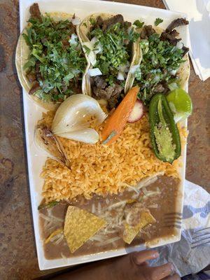 Taco plate, 1 Al Pastor and 2 Asada with rice and the best beans!