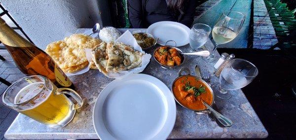 Chicken Tikka masala , goat saag, aloo puri, garlic naaan.