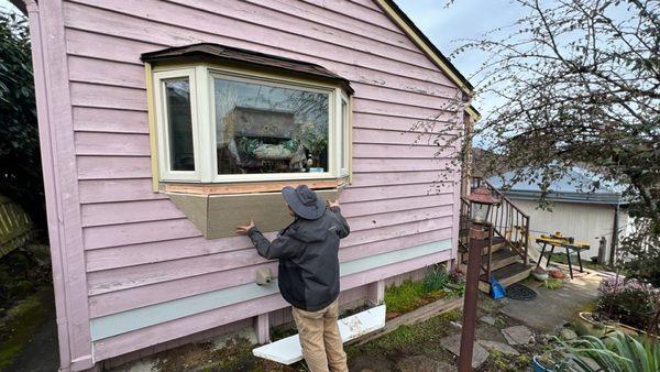 Sound Painting Solutions carpenter working on an exterior project.