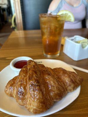 A fresh crescent with homemade jam.