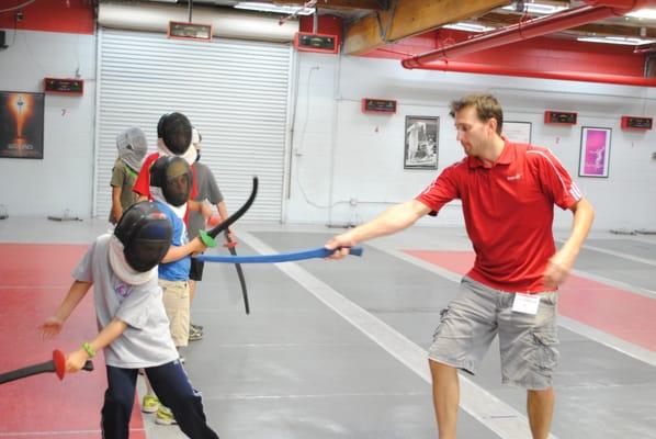 Coach Bryan leading the "Game of Doom"