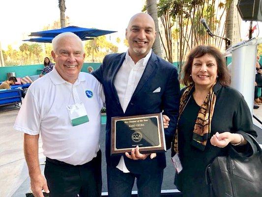 2019 DRY CLEANER of the year winner.(Jim Douglass president of The CCA, Sajid Veera & Yasmin Veera.