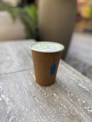 Hot matcha latte with oat milk