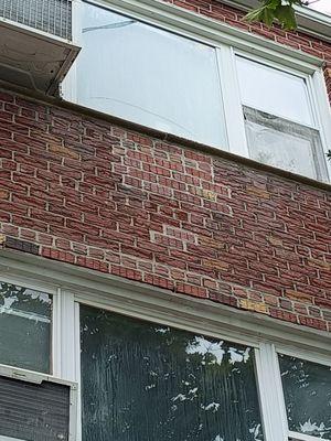 Removal of air conditioner sleeve and infill with brick