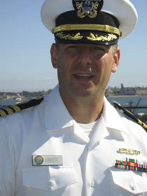 CDR Christopher Abbott speaking aboard USS Midway (CV-41), San Diego in October 2014.