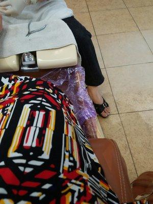 I love how covers are being used for each customer's pedicure. Definitely keeping it clean and safe for everyone!