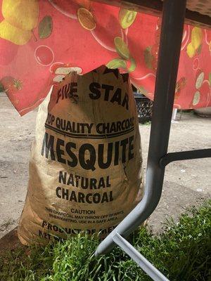 They use mesquite charcoal...gives it that smoke taste.