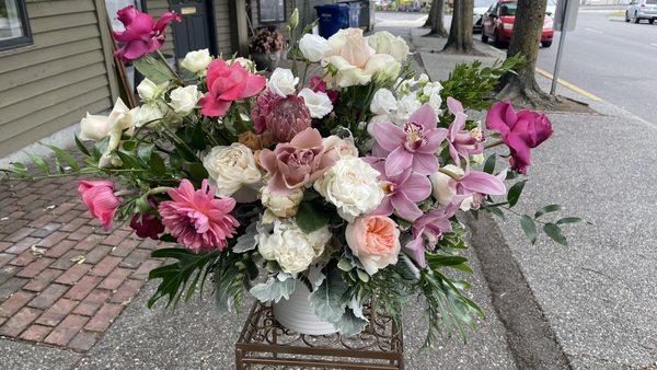 A luxurious a showy arrangement for a lucky party host!