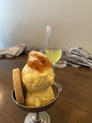 Orange ice cream with candied orange and ginger cookie