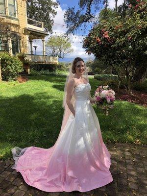 My couture silk taffeta wedding gown (gown skirt is detachable and turns into a party wiggle dress underneath) and pearl drop veil.