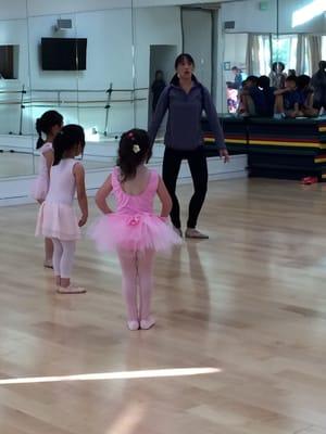 Beginning ballet for the little girls.  So sweet!  I like how the instructor ends the class with a follow the leader dance.