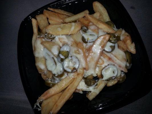 Awesome French Fries w/  cheddar cheese & jalapenos.. w/a side order of sour cream great appetizer & super accommodating staff.