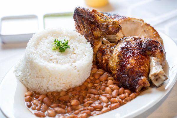 half chicken with rice and beans