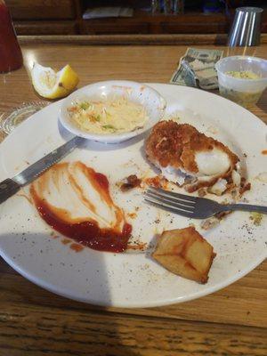 I had intended on taking a picture of my plate but as soon as I took the first bite I got lost. The fish was perfect .