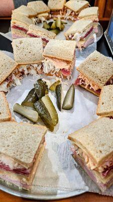 The Original Sloppy Joe sandwich. Two servings. Ham, beef tongue, Swiss, rye, dry coleslaw, Russian dressing.