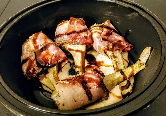 FONDI CARCIOFI: Roman artichokes wrapped with speck over horseradish sauce. $14