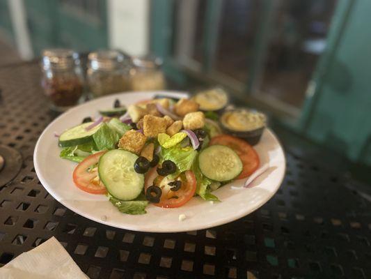 Salad has the perfect mix of greens, croutons and home-made Italian dressing