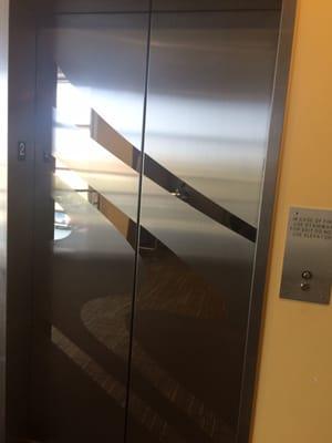 Take elevator to 2nd floor