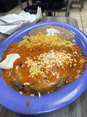 Rellenos de chile con salsa y queso with rice and refried beans. $7 from lunch menu