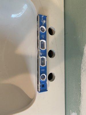 Faucet holes cut crooked.