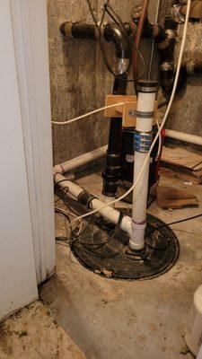 This is a sump pump that discharges the basement bathroom waste.