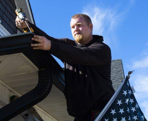 Professional installation of our gutter guard system.