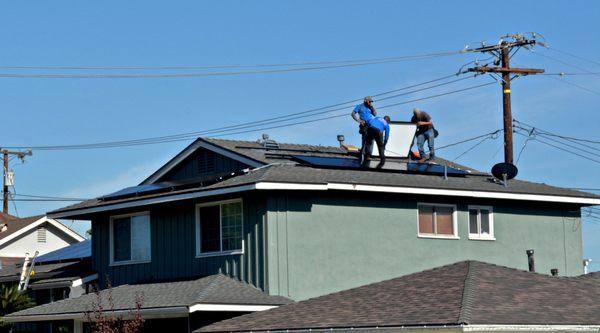 Our installation team doing a great job installing the South array on Mr. Ferguson's 11.52KW LG Electronics Solar System!