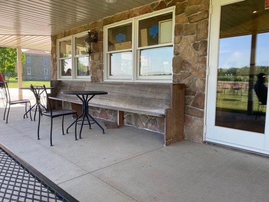 Some of the outdoor seating on their covered patio