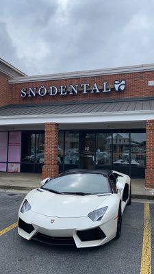 Front office view with one of our patient's cool rides! A dedicated lot is present with plenty of parking.