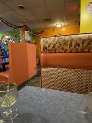 Retro cowboy and Indian booths make it cozy