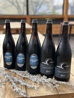 Quadsmas lineup in bottles! Darkest Night Quads 2019-2023.