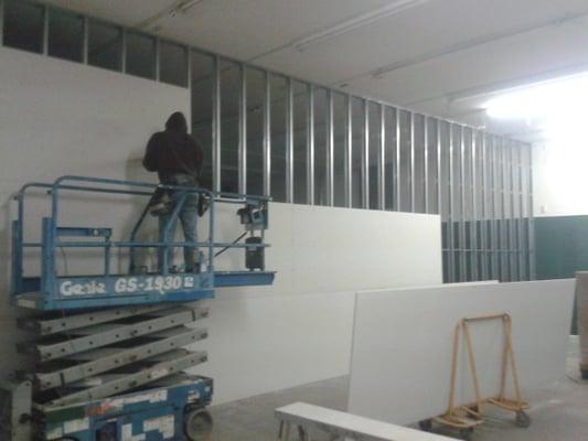 Commercial metal-stud installation and drywall.